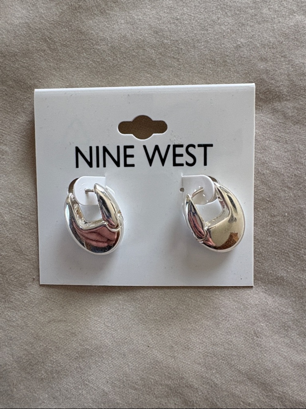 Nine West Shiny Silver Crescent Hoop Earrings